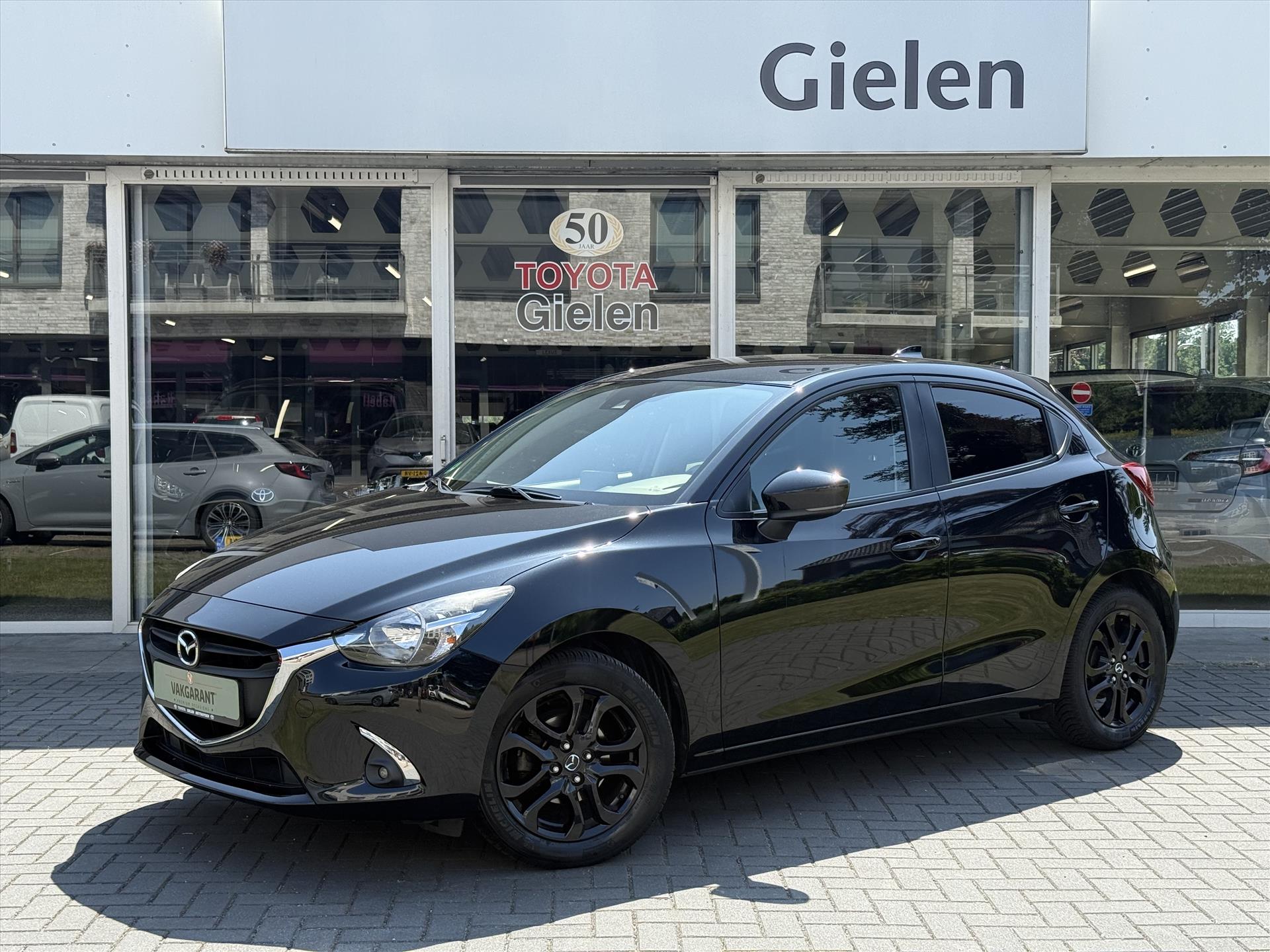 Mazda 2 1.5 SKYACTIV-G Sport Selected | Trekhaak, Cruise control, Navigatie, Parkeercamera, 16 inch, Zeer netjes! 45825840-0.jpg | Autobedrijf Gielen